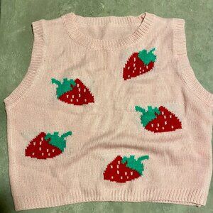 NEW condition, strawberry crop top, size small.